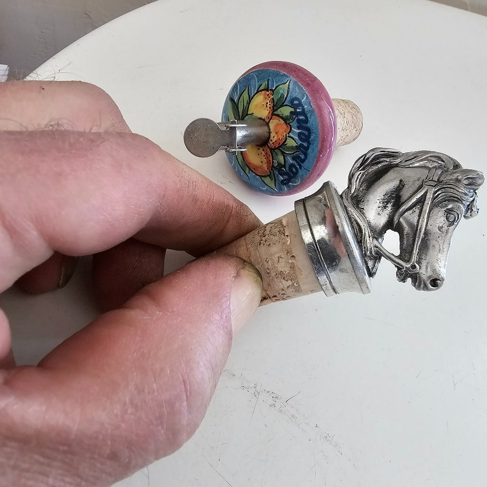 Pair wine and liquor tops pour spout.
